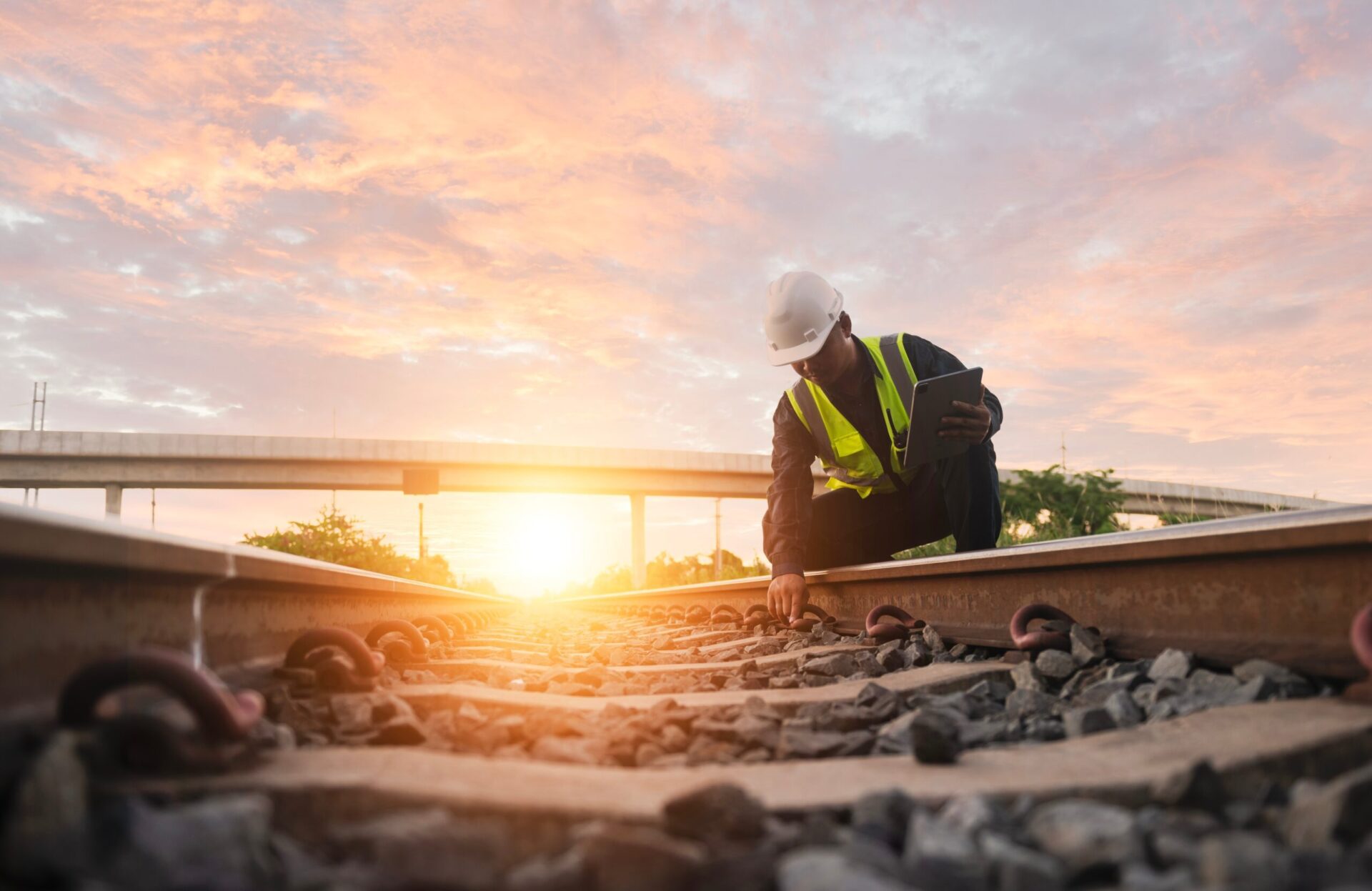 Asian,Engineer,Inspects,Trains,Construction,Workers,On,The,Railway,Engineer