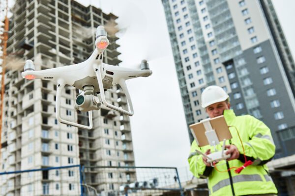 Drone,Operated,By,Construction,Worker,On,Building,Site