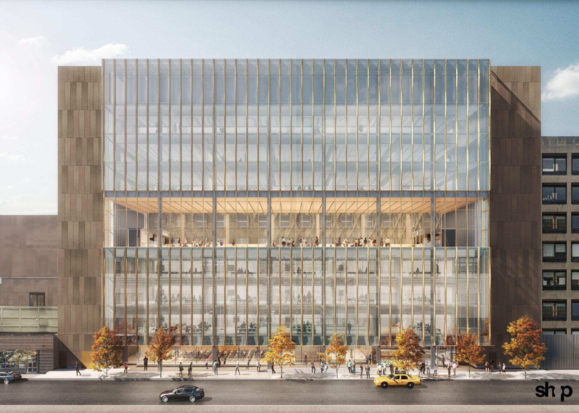 SUNY Fashion Institute of Technology building with glass walls and people walking on the street