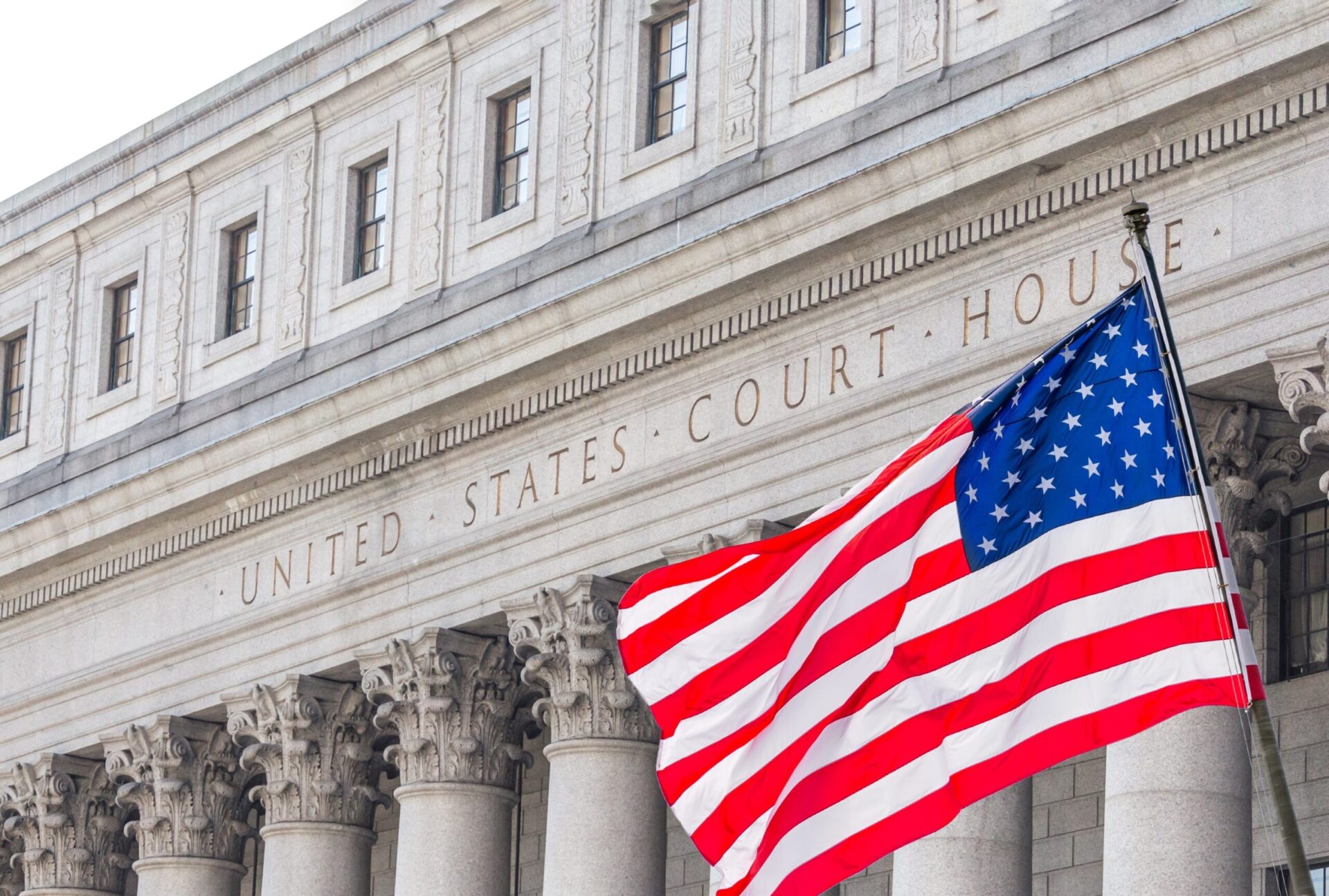 Usa,National,Flag,Waving,In,The,Wind,In,Front,Of